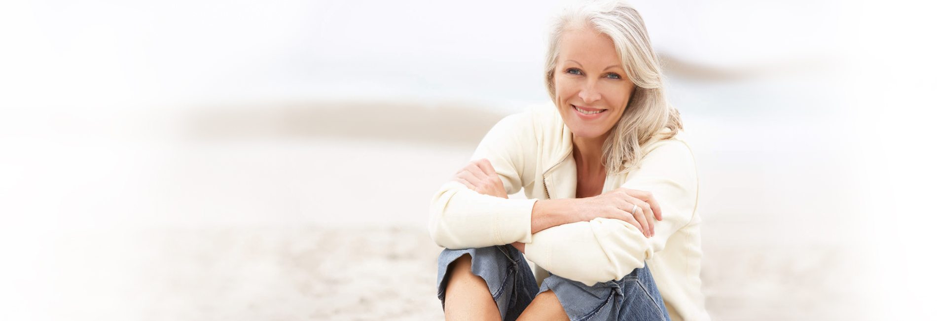 Maids2000 - Testimonials - Woman Relaxing on Beach Slider